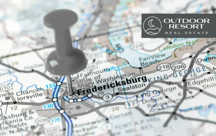 White thumb tack pinned into a map to mark Why Investors Love Fredericksburg for RV Properties and outdoor resort real estate opportunities.