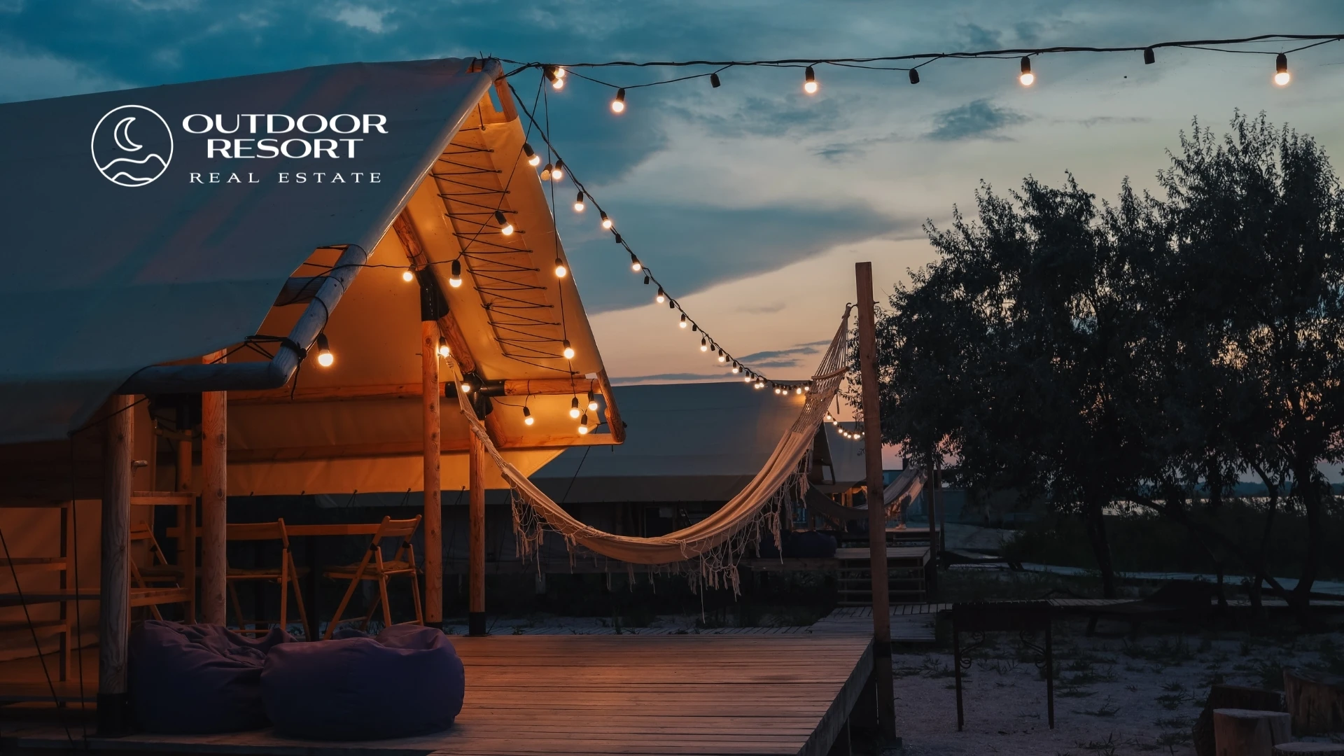 Top Outdoor Resort Markets 2026 - Outdoor Resort Real Estate glamping tent with string lights at sunset.